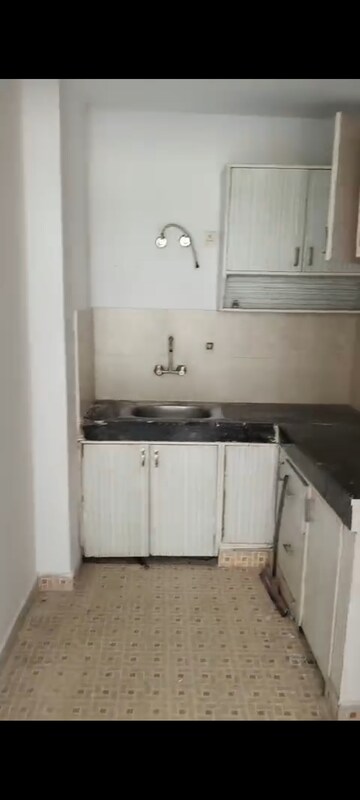 Kitchen in 1 BHK Apartment at AVJ Heightss, Zeta I Greater Noida – for Rent