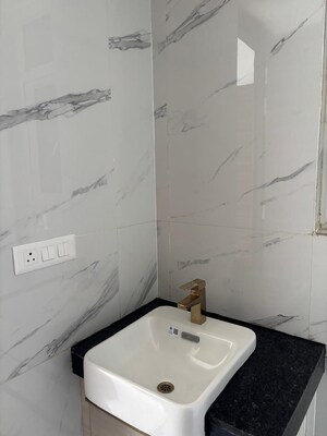 Bathroom in 3 BHK Apartment at Smart World Orchard, Sector 61 – for Sale