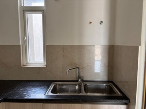 Kitchen in 3 BHK Apartment at Smart World Orchard, Sector 61 – for Sale