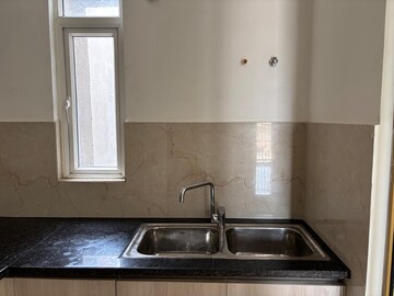 Kitchen in 3 BHK Apartment at Smart World Orchard, Sector 61 – for Sale