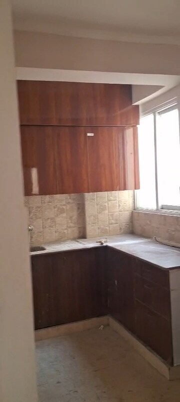Kitchen in 2 BHK Apartment at Amrapali Golf Homes, Sector 4, Greater Noida – for Rent