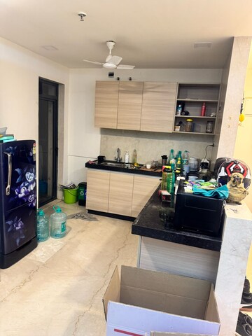 Kitchen in 1 BHK Apartment at Omkar Vive, Kurla – for Rent