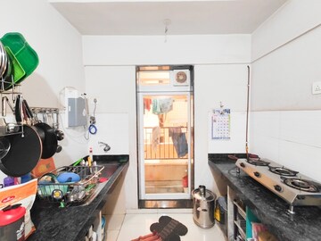 Kitchen in 2 BHK Apartment at Rustomjee Urbania Azziano, Majiwada – for Sale