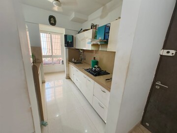 Kitchen in 3 BHK Apartment at Puranik Rumah Bali, Ghodbunder Road – for Rent