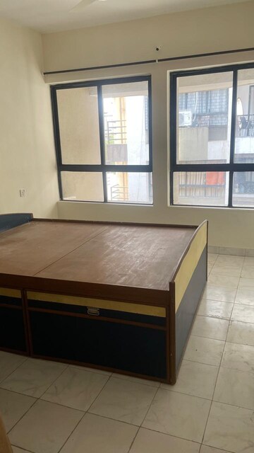 Bedroom in 2 BHK Apartment at Sunflower Apartment CHS, Kondhwa – for Rent