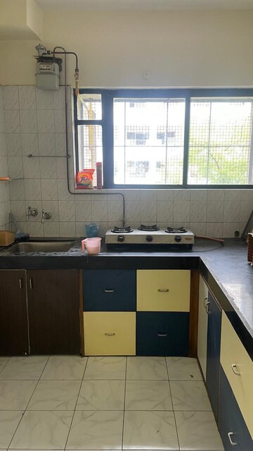 Kitchen in 2 BHK Apartment at Sunflower Apartment CHS, Kondhwa – for Rent