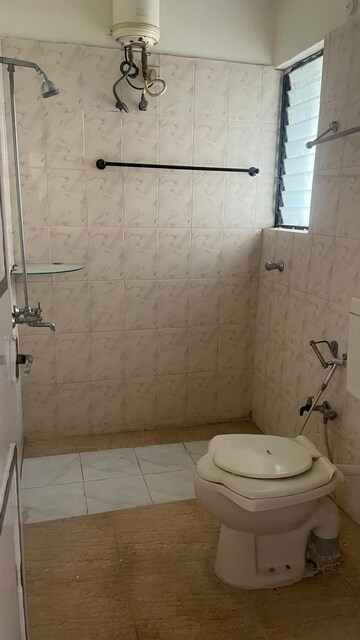 Bathroom in 2 BHK Apartment at Sunflower Apartment CHS, Kondhwa – for Rent