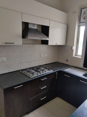 Kitchen in 3 BHK Builder Floor at Ansal API Versalia, Sector 67a – for Sale