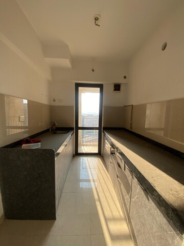Kitchen in 1.5 BHK Apartment at Lodha Palava City Lakeshore Greens, Dombivli East – for Rent