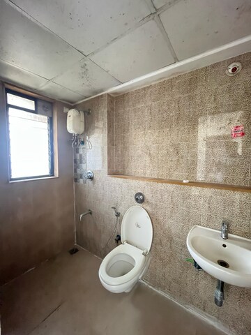 Attached Bathroom in 1.5 BHK Apartment at Lodha Palava City Lakeshore Greens, Dombivli East – for Rent