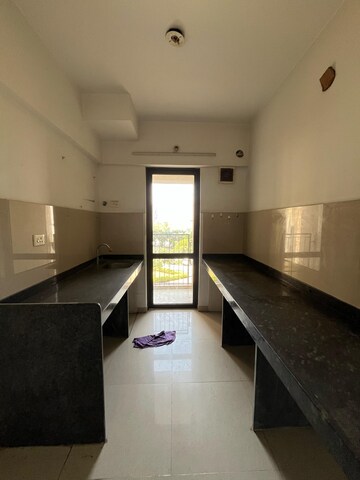 Kitchen in 1.5 BHK Apartment at Lodha Palava City Lakeshore Greens, Dombivli East – for Rent