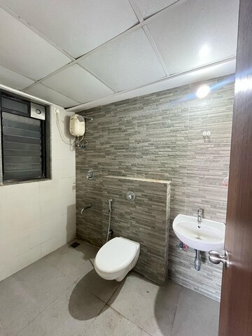 Bathroom in 1.5 BHK Apartment at Lodha Palava City Lakeshore Greens, Dombivli East – for Rent