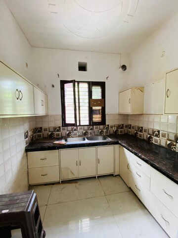 Kitchen in 2 BHK Apartment at Sunny Enclave – for Rent