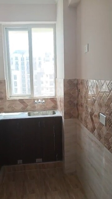 Kitchen in 2 BHK Apartment at Amrapali Golf Homes, Sector 4, Greater Noida – for Rent
