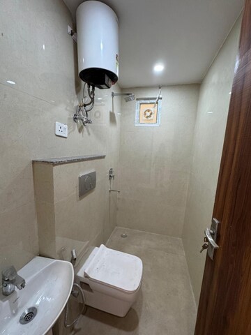 Bathroom in 1 BHK Builder Floor at Chattarpur – for Sale