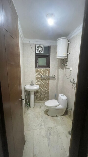 Bathroom in 3 BHK Builder Floor at Mehrauli – for Sale