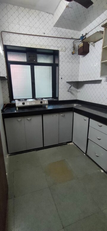 Kitchen in 1 BHK Apartment at Shah Arcade II, Malad East – for Rent
