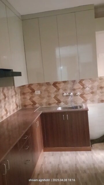 Kitchen in 3 BHK Apartment at Amrapali Golf Homes, Sector 4, Greater Noida – for Rent