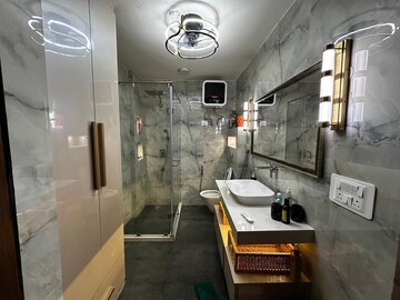 Bathroom in 3.5 BHK Apartment at Gardenia Golf City, Sector 75 – for Sale