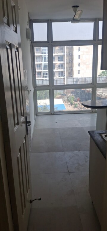 Living Room in 2 BHK Apartment at Jaypee Greens Pavilion Court, Sector 128 – for Rent