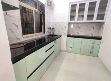 Kitchen in 1 BHK Apartment at Swastik Residency Phase II CHS Ltd, Ghodbunder Road – for Rent
