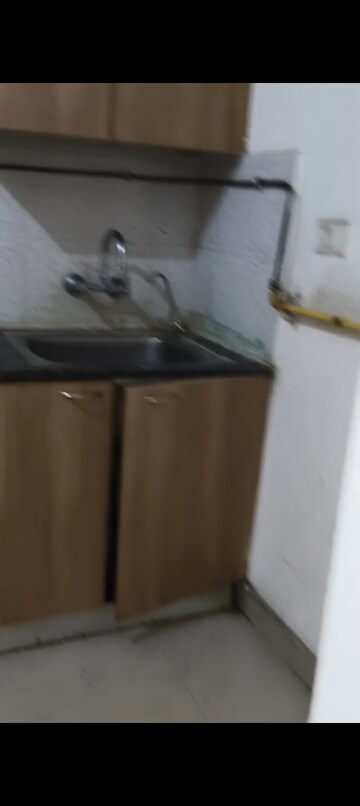Kitchen in 2 BHK Apartment at Hawelia Valencia Homes, Sector 1 Greater Noida – for Rent