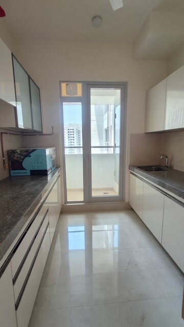 Kitchen in 2 BHK Apartment at Piramal Vaikunth, Balkum Pada – for Rent