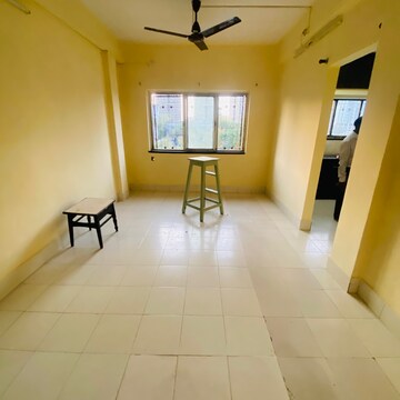 Living Room in 1 BHK Apartment at Shirke Omkar CHS, Sion – for Rent