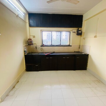 Kitchen in 1 BHK Apartment at Shirke Omkar CHS, Sion – for Rent