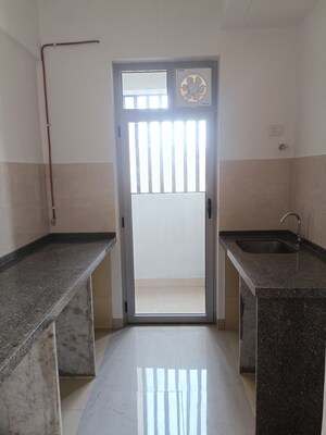 Kitchen in 1 BHK Apartment at Piramal Revanta, Mulund West – for Sale