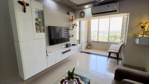 Living Room in 1 BHK Apartment at Dosti Group Maitri Gardens, Oswal Park – for Sale