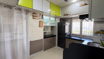 Kitchen in 1 BHK Apartment at Dosti Group Maitri Gardens, Oswal Park – for Sale