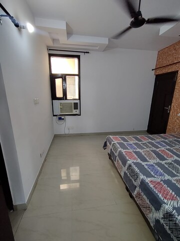 Bedroom in 1 RK Apartment at Dhakoli Village – for Rent
