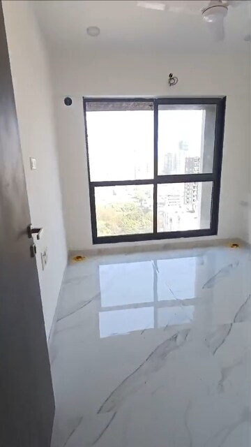 Room in 2 BHK Apartment at Dev Leo Tower, Oshiwara – for Rent