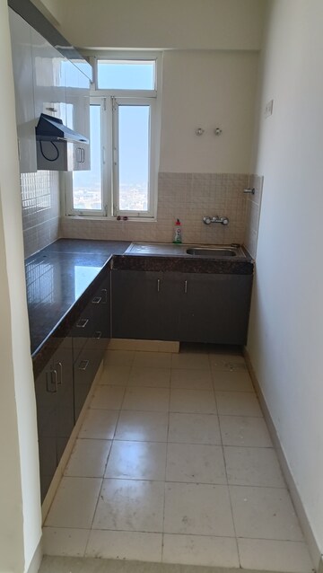 Kitchen in 2 BHK Apartment at Shree Vardhman Mantra, Sector 67 – for Rent