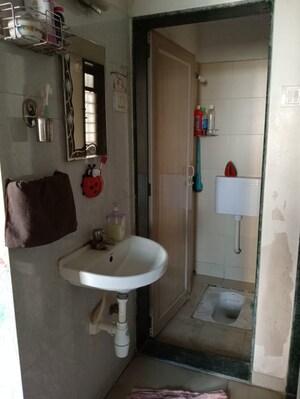Bathroom in 1 BHK Apartment at Puranik City Phase III, Ghodbunder Road – for Sale