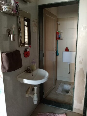 Bathroom in 1 BHK Apartment at Puranik City Phase III, Ghodbunder Road – for Sale