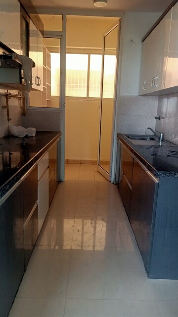 Kitchen in 3 BHK Apartment at Mahagun Mirabella, Sector 79 – for Sale