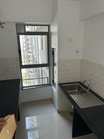 Kitchen in 3 BHK Apartment at Kalpataru Immensa, Kolshet Road – for Rent