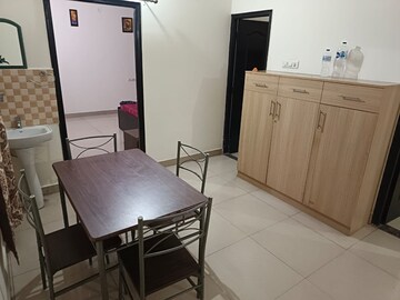 Living Room in 2 BHK Apartment at Swastik Amaravati, Ramnagar – for Rent