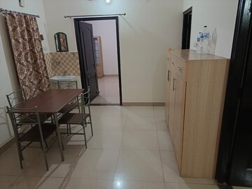 Living Room in 2 BHK Apartment at Swastik Amaravati, Ramnagar – for Rent