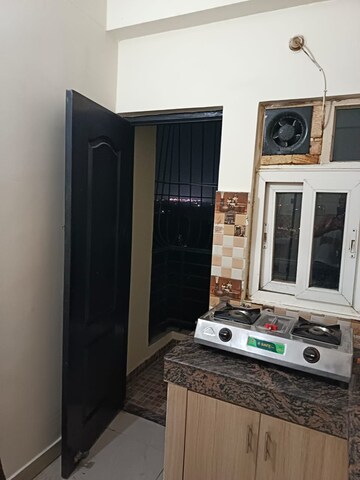 Kitchen in 2 BHK Apartment at Swastik Amaravati, Ramnagar – for Rent