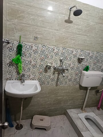 Bathroom in 2 BHK Apartment at Swastik Amaravati, Ramnagar – for Rent