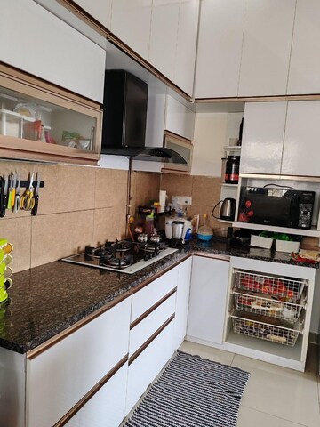 Kitchen in 1 BHK Apartment at Prestige Tranquility, Budigere – for Sale