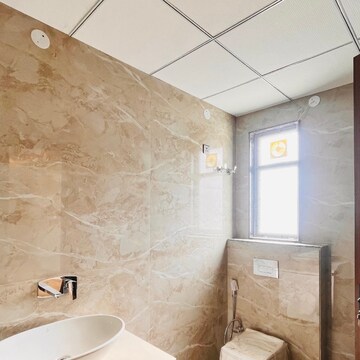 Bathroom in 3.5 BHK Builder Floor at Ansal Versalia Phase A2, Sector 67 – for Sale
