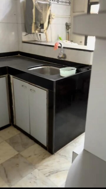 Kitchen in 2 BHK Apartment at Malhar Tower, Goregaon East – for Sale