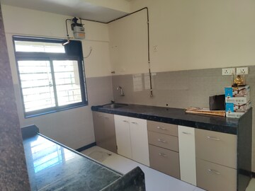 Kitchen in 3 BHK Apartment at Acme Ozone, Manpada – for Rent
