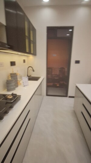 Kitchen in 2 BHK Apartment at Lokhandwala Complex – for Sale