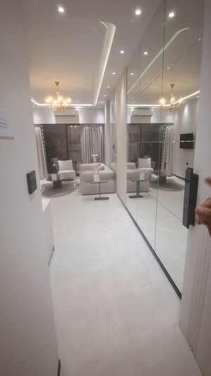 Living Room in 2 BHK Apartment at Lokhandwala Complex – for Sale