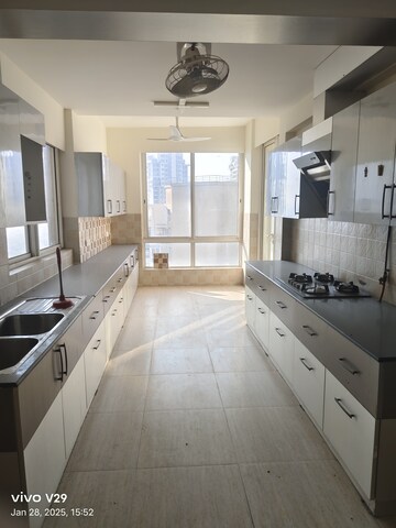 Kitchen in 4 BHK Apartment at Mahindra Luminare, Sector 59 – for Rent